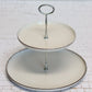 2-Stufige Etagere aus Porzellan Farbe Créme in gold oder silber